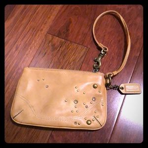 Coach leather + stud wristlet